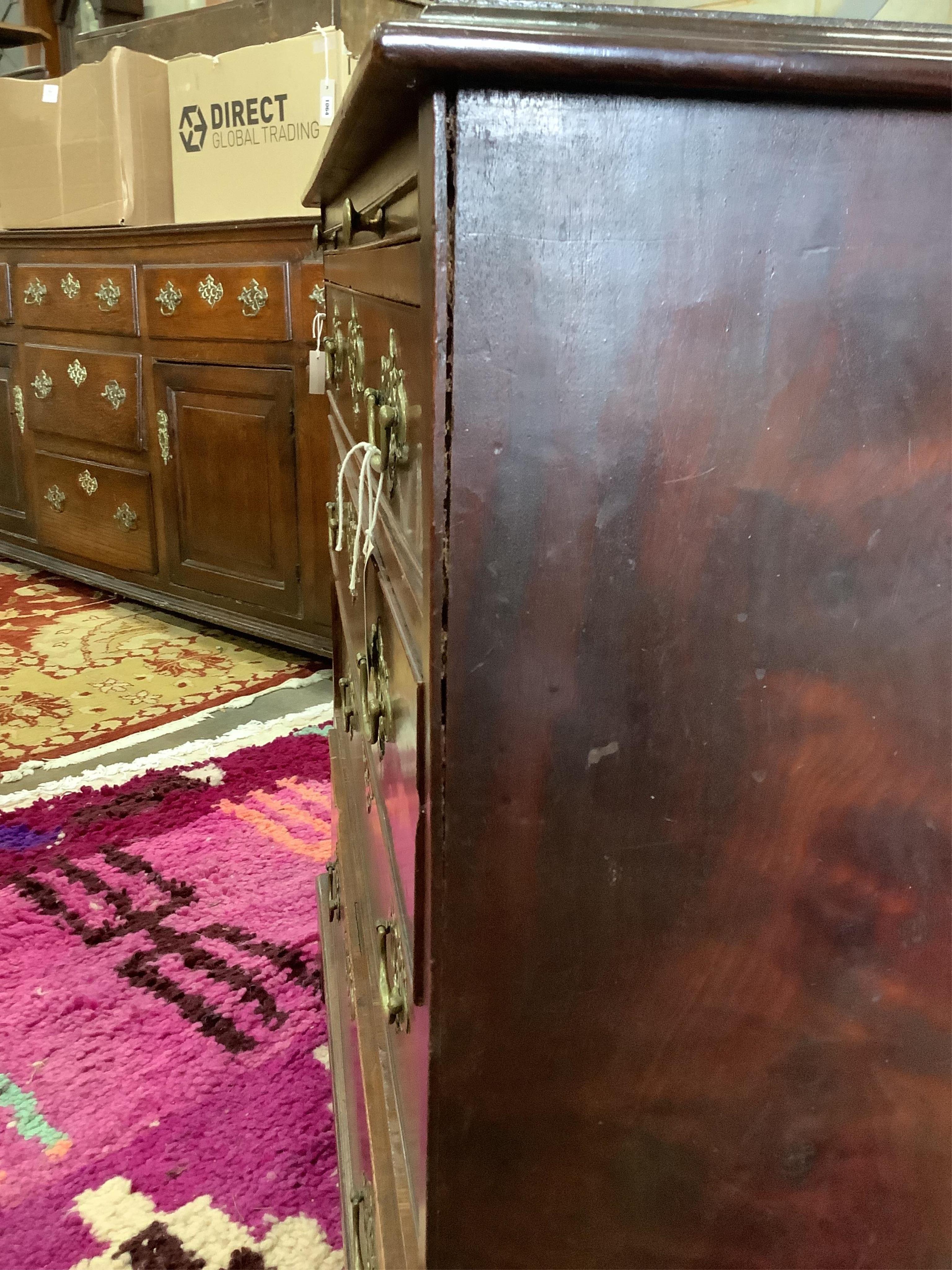A small George III mahogany chest, fitted four long drawers, beneath a brushing slide, width 80cm, depth 49cm, height 81cm. Condition - fair